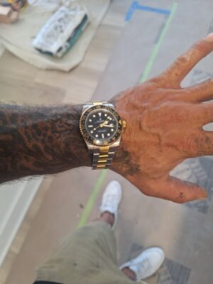 Replica Rolex GMT-Master II 40mm Black Dial 116713 photo review
