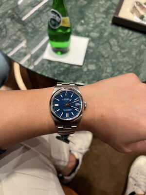 Replica Rolex Oyster Perpetual 41mm Yellow Dial 124300 photo review