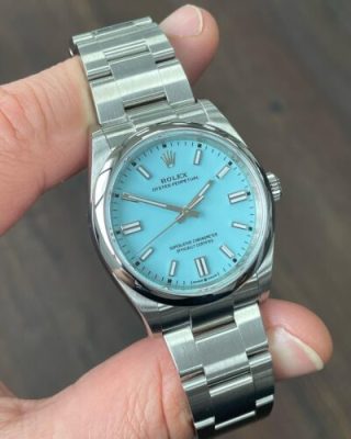 Replica Rolex Oyster Perpetual Lady 36mm Yellow Dial 126000 photo review