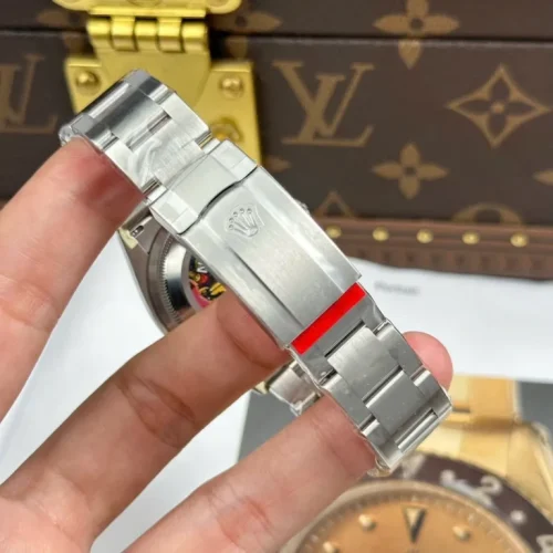 Replica Rolex Oyster Perpetual Lady 36mm Yellow Dial 126000 photo review