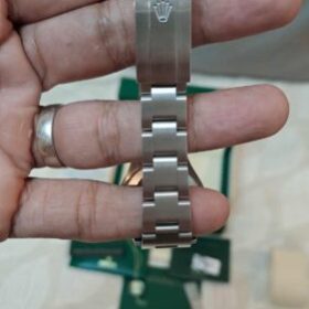 Replica Rolex Oyster Perpetual Date 34mm Salmon Dial 115200 photo review