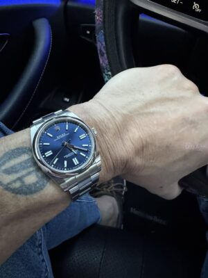 Replica Rolex Oyster Perpetual 41mm Yellow Dial 124300 photo review